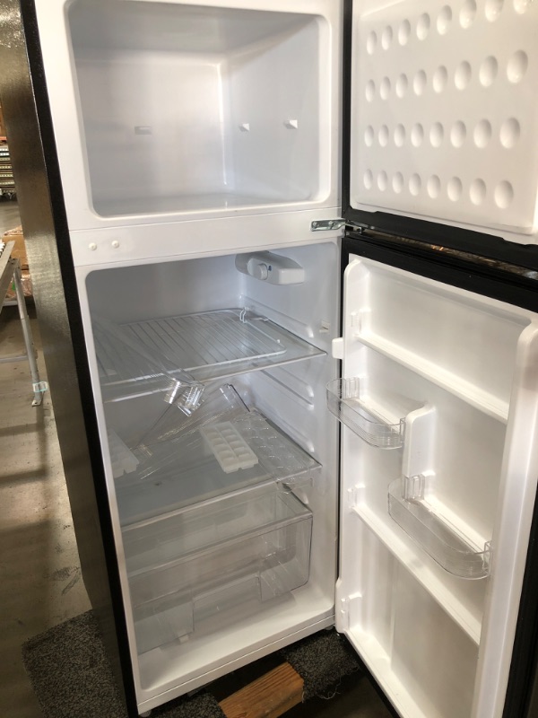 Photo 2 of ***DAMAGED** Frigidaire 7.2 Cu. Ft. Top Freezer Stainless Steel Apartment Size Refrigerator
