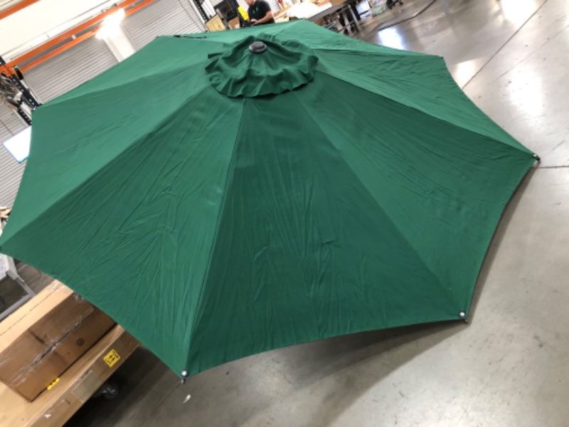 Photo 3 of (MISSING POLE; LOOSE TILT JOINT)
11 ft. Market Patio Umbrella with Push Tilt and Crank in Green
