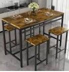 Photo 1 of (DAMAGED TABLE CORNER)
4 Person Dining metal table and chairs rustic brown