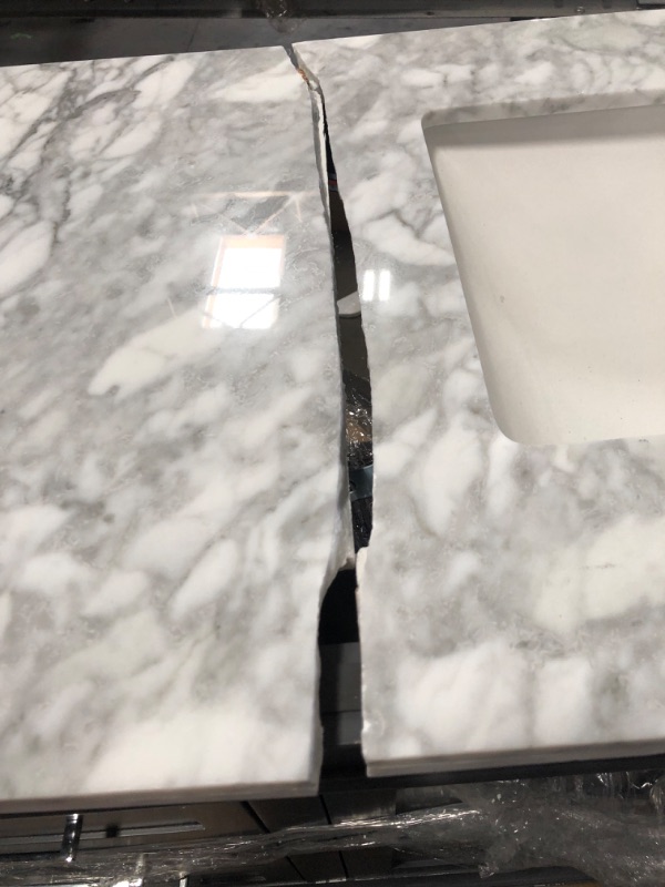 Photo 8 of (MARBLE CRACKED IN HALF; DAMAGED FRAME; BROKEN LEG)
Home Decorators Collection Sonoma 72 in. W X 22 in. D Vanity in Dark Charcoal with Vanity Top in Carrara with White Basins
