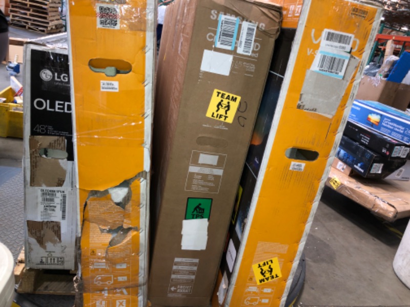 Photo 4 of Nonrefundable -sold as -Pallet of 5 broken, nonfunctional , damaged Tv's and monitors, different sizes and models . 
2 tvs are 65" /48" / 70" / 27"