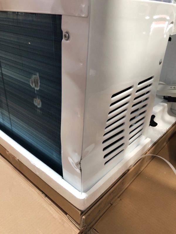 Photo 17 of Exclusive 6,000 BTU Energy Star First Ever Over the Sill Air Conditioner  Hybrid (Saddle) Window Air Conditioner with Wifi
