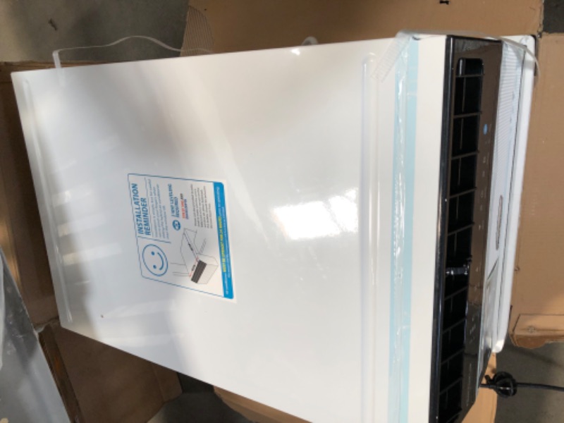 Photo 15 of Exclusive 6,000 BTU Energy Star First Ever Over the Sill Air Conditioner  Hybrid (Saddle) Window Air Conditioner with Wifi
