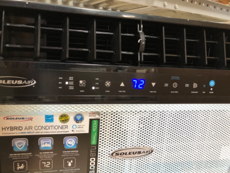 Photo 1 of Exclusive 6,000 BTU Energy Star First Ever Over the Sill Air Conditioner  Hybrid (Saddle) Window Air Conditioner with Wifi
