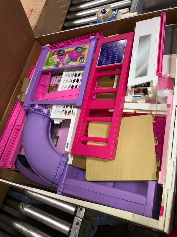 Photo 4 of Barbie Dreamhouse Dollhouse with Wheelchair Accessible Elevator, Pool, Slide and 70 Accessories Including Furniture and Household Items