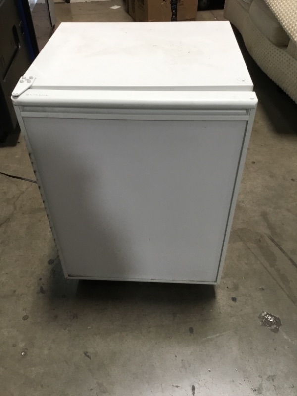 Photo 2 of ULINE SMALL PERSONAL REFRIGERATOR 73FL COLUME DAMAGE AND WEAR FROM USE