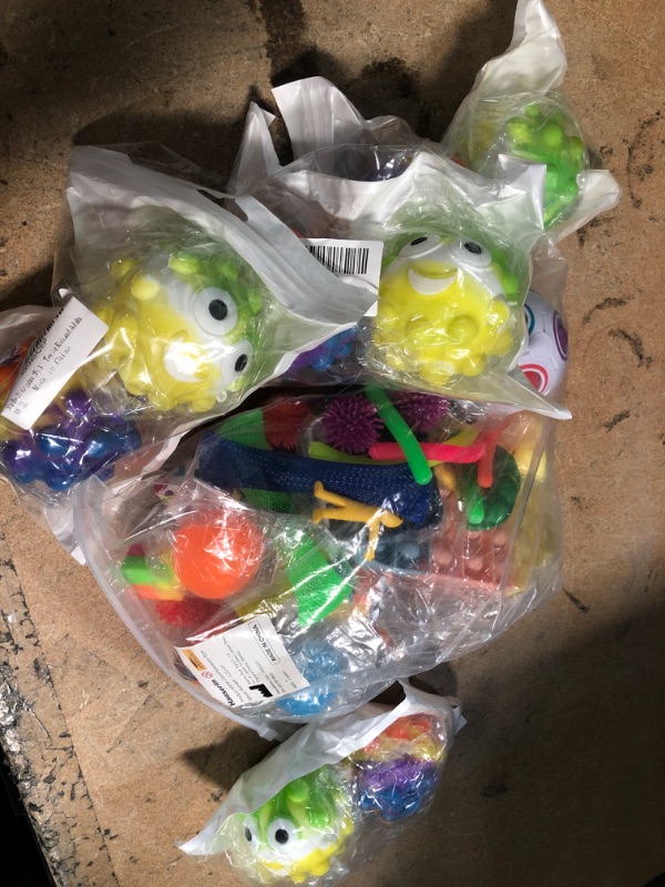 Photo 1 of fidget toy bundle - sold as is - no refunds