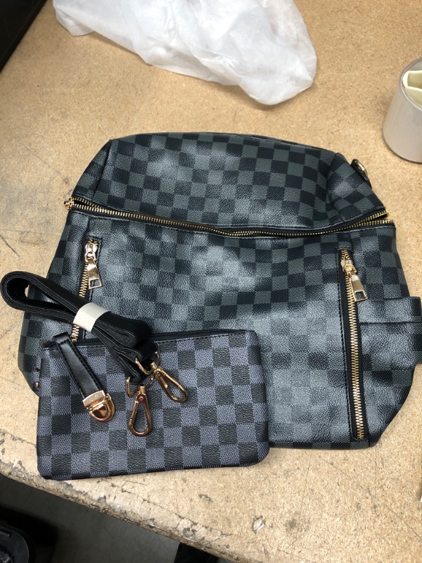 Photo 1 of Black Checkered Backpack