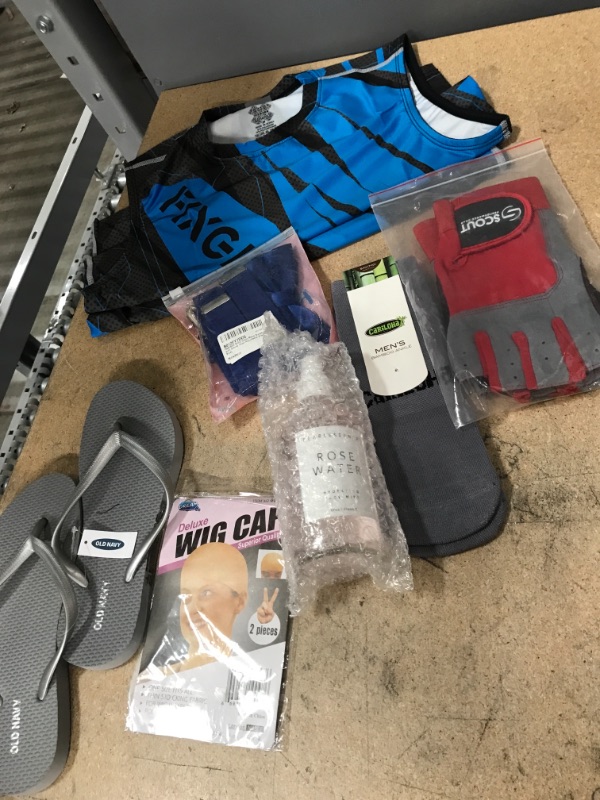 Photo 1 of ASSORTED BUNDLE OF CLOTHES AND ACCESSORIES FOR MEN AND WOMEN, PAIR OF SANDLES, SOCKS, GLO VES, AND MORE 