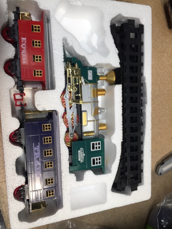 Photo 2 of Electronic Classic Train Set for Kids with Headlight, Realistic Sound, Smoke, Toy Train 1 Locomotive, 2 Compartments, 10 Railway Tracks,
