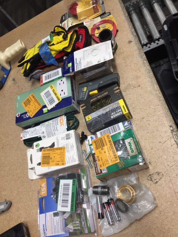 Photo 1 of **NO REFUNDS/RETURNS** -Bundle of miscellaneous home depot goods screws, cables, gloves, etc. 
