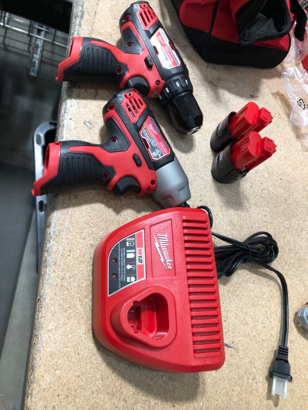 Photo 5 of Milwaukee M12 Lithium-Ion Cordless Power Tool Set 3/8Inch Drill and 1/4Inch Hex Impact Driver, 2 Batteries, Model 2494-22