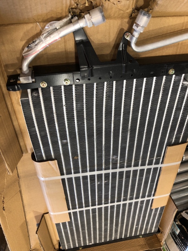 Photo 1 of **MINOR SHIPPING DAMAGE** UAC CN 4295PFC A/C Condenser
