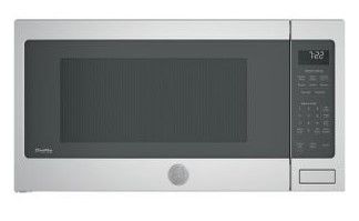 Photo 1 of Profile 2.2 cu. ft. Countertop Microwave in Stainless Steel with Sensor Cooking
MINOR DENT