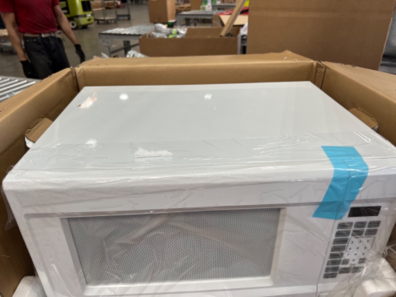 Photo 1 of 1.4 cu. ft. Countertop Microwave in White
