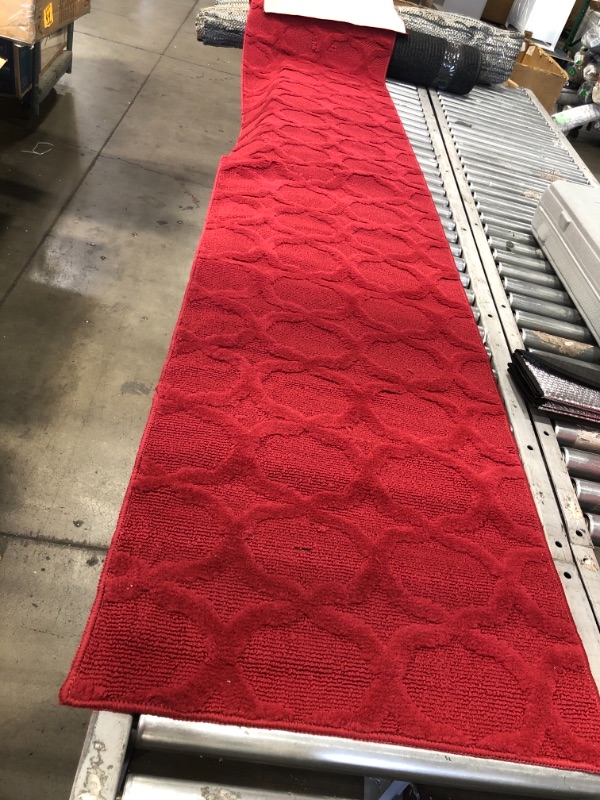 Photo 1 of 12' x 2' red rug