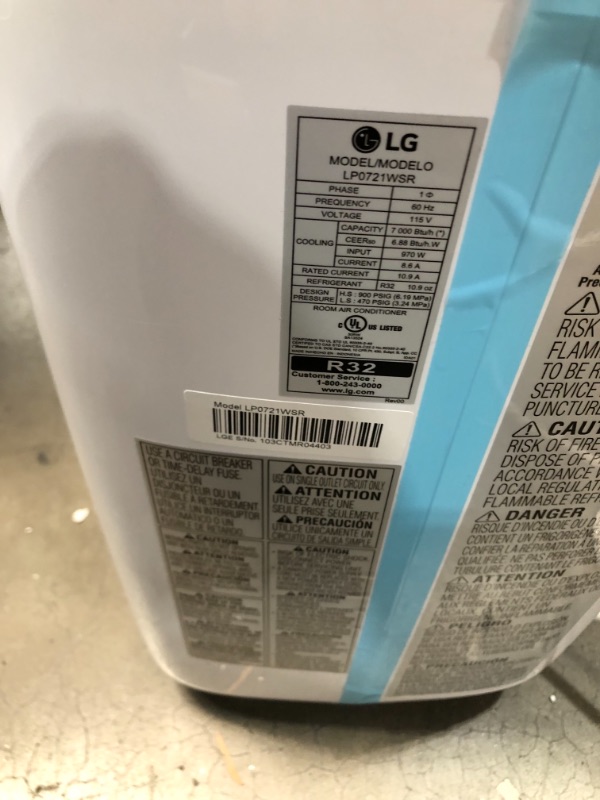 Photo 8 of LG 7,000 BTU (DOE) / 10,000 BTU (ASHRAE) Portable Air Conditioner, Cools 300 Sq.Ft. (12' x 25' room size), Quiet Operation, LCD Remote, Window Installation Kit Included, 115V