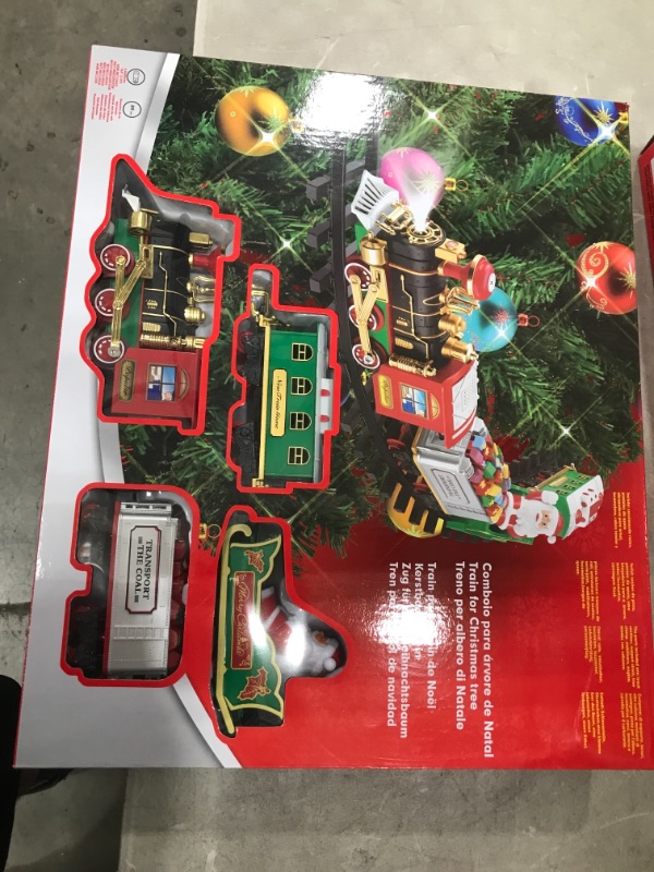 Photo 2 of TEMI Train Set Toys Around Tree, Electric Railway Train Set w/ Locomotive Engine, Cars and Tracks, Battery Operated Play Set w/ Lights and Sounds, Christmas Spirit Gift for Kids Boys Girls
