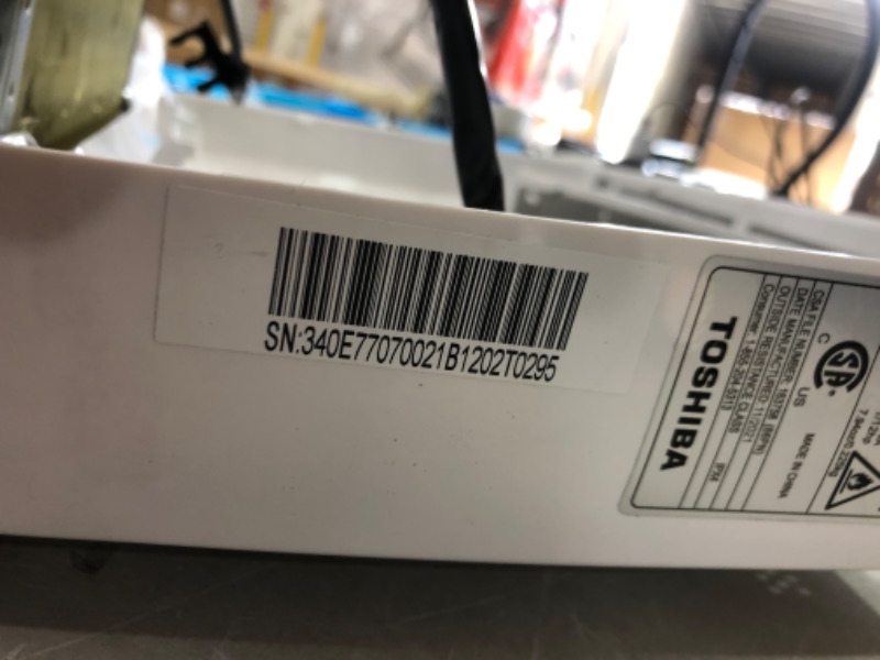 Photo 6 of (NON FUNCTIONAL EXHAUST/FAN; BROKEN OFF FRONT PLATE; DENTED)
Toshiba 6,000 BTU 115-Volt Window Air Conditioner with Remote in White
