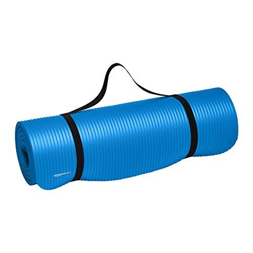 Photo 1 of Amazon Basics Extra Thick Exercise Yoga Gym Floor Mat with Carrying Strap - 74 X 24 X .5 Inches, Blue
