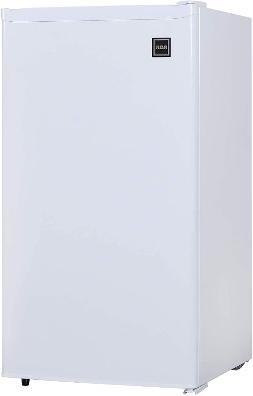 Photo 1 of PARTS ONLY FREEZER IS THE ONLY PART THAT IS GETTING COLD 
RCA RFR321-FR320/8 IGLOO Mini Refrigerator, 3.2 Cu Ft Fridge, White