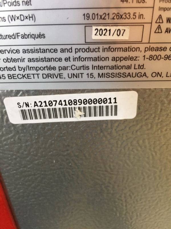 Photo 1 of PARTS ONLY FREEZER IS GETTING COLD ONLY 
Frigidaire EFR840-RED 3.2 Cu Ft Red 2 Door Retro Bar Fridge with Side Bottle Opener
