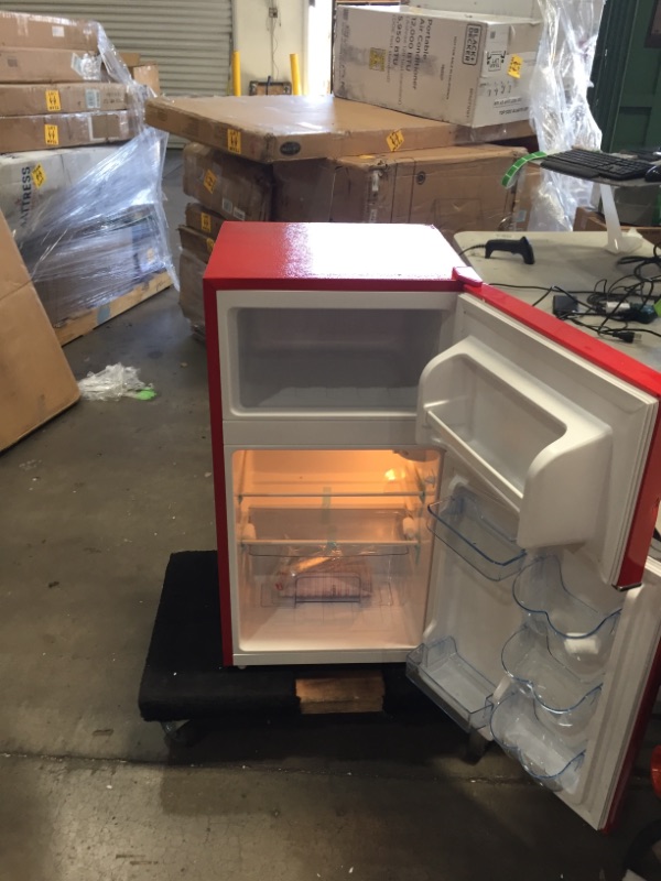 Photo 3 of PARTS ONLY FREEZER IS GETTING COLD ONLY 
Frigidaire EFR840-RED 3.2 Cu Ft Red 2 Door Retro Bar Fridge with Side Bottle Opener