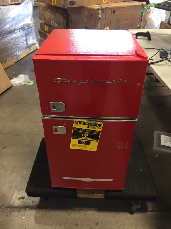 Photo 2 of PARTS ONLY FREEZER IS GETTING COLD ONLY 
Frigidaire EFR840-RED 3.2 Cu Ft Red 2 Door Retro Bar Fridge with Side Bottle Opener