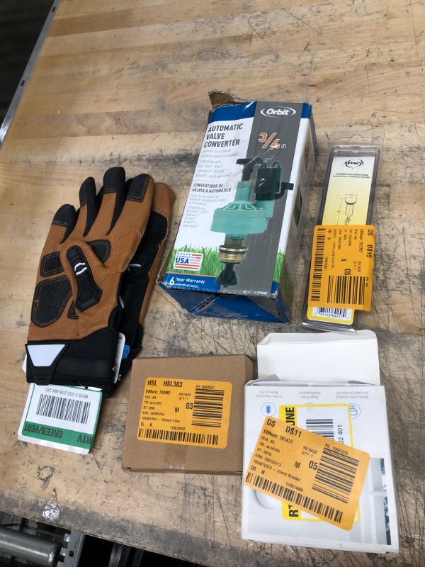 Photo 3 of * no refunds and non returnable* Bundle of plumbing supplies and misc tools including brackets, automatic valve converter, gloves and tape.