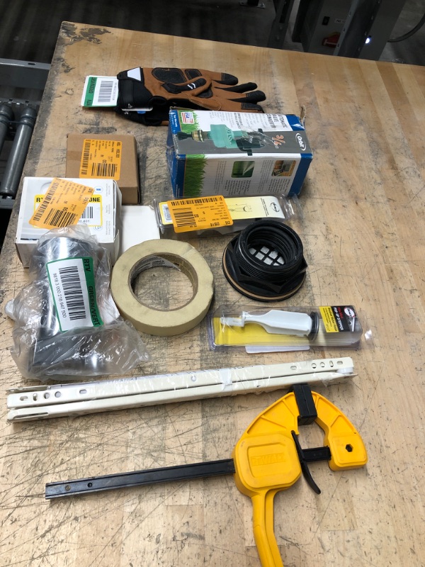 Photo 1 of * no refunds and non returnable* Bundle of plumbing supplies and misc tools including brackets, automatic valve converter, gloves and tape.