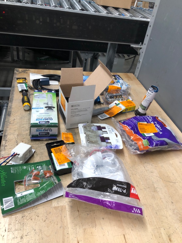 Photo 1 of *no returns and non refundable* bundle of misc small tools, plumbing and home goods plus accessories including pop up drain, caulk saver, studsensor, gear and more.