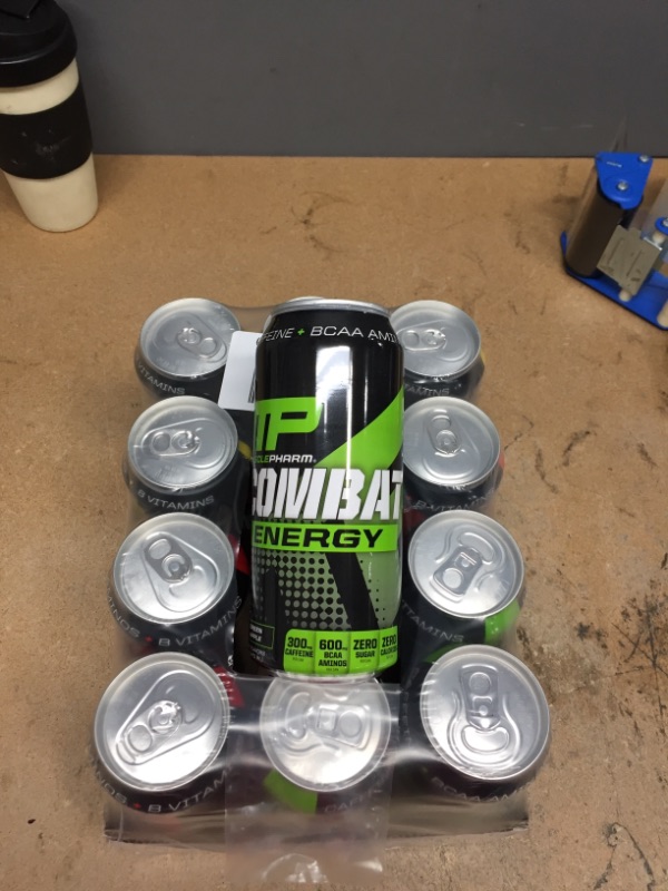 Photo 2 of ***non-refundable***
no printed best by date 
MusclePharm Combat Energy Drink 16oz (Pack of 12) Variety Pack - Grapefruit Lime, Green Apple & Black Cherry - Sugar Free Calories Free - Perfectly Carbonated with No Artificial Colors or Dyes
