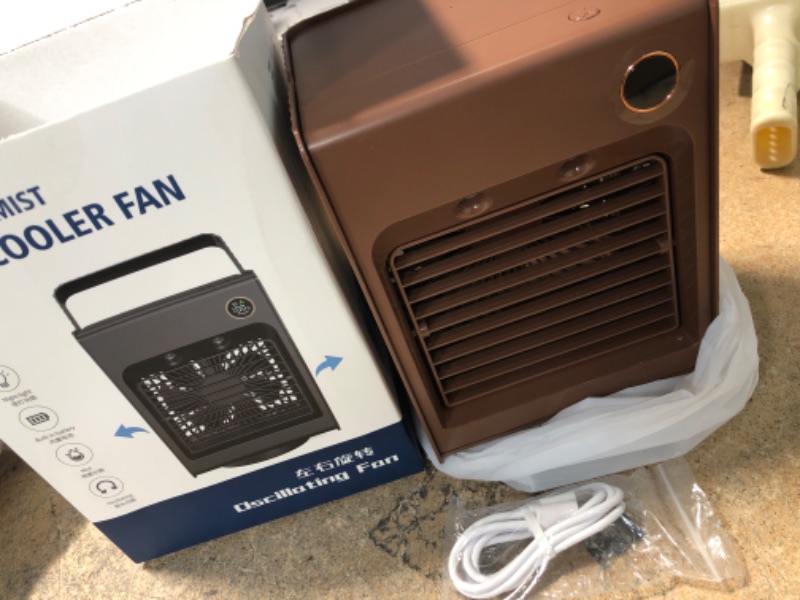 Photo 2 of ***MIST FUNCTION DOES NOT WORK*** Wassteel Small Portable Air Conditioner for Mini Personal Air Cooler Fan, Humidifier Spray Build-in Ice Tray/USB Charger/Light/ Head Shaking, Fit for Kids/Small Room/Office 5.7x7.8x4.7 inch (Brown)