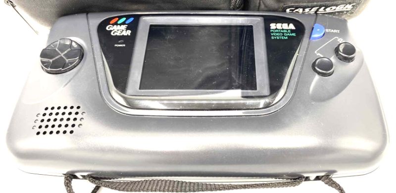Photo 1 of VINTAGE SEGA GAME GEAR WITH 2 GAMES NO CORD