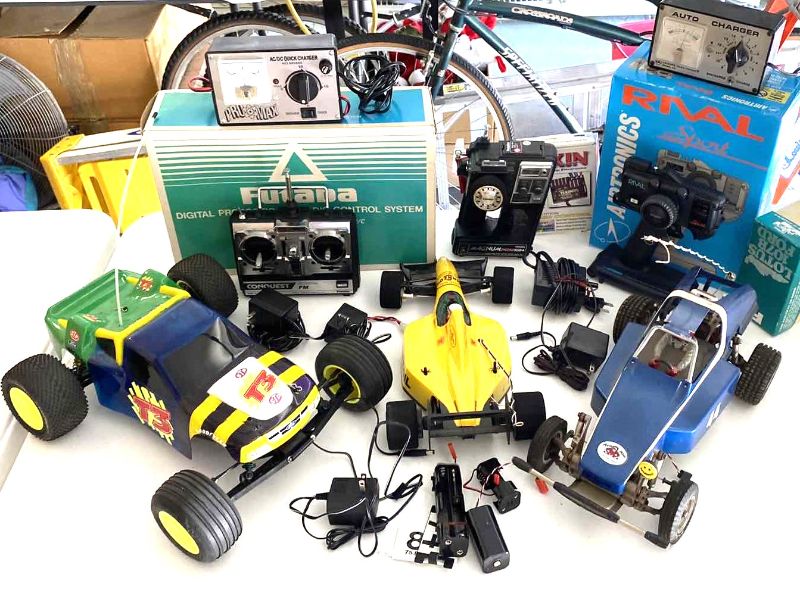Photo 1 of 3-REMOTE CONTROL CARS, ASSORTED CONTROLLERS AND ACCESSORIES