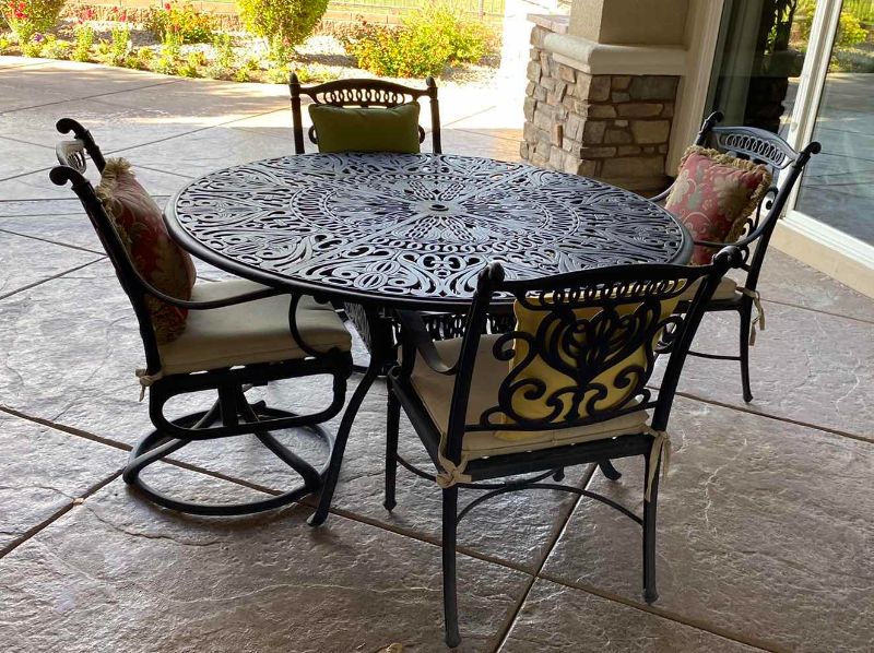 Photo 6 of HEAVY WROUGHT IRON PATIO TABLE 50” X 30”  (4 CHAIRS WITH CUSHIONS SOLD SEPERATELY)