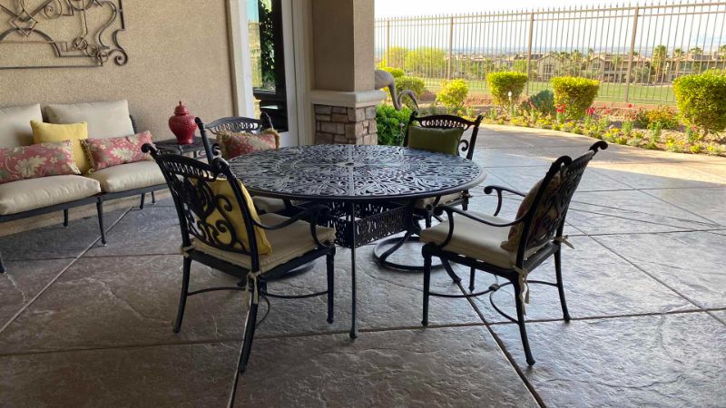 Photo 4 of HEAVY WROUGHT IRON PATIO TABLE 50” X 30”  (4 CHAIRS WITH CUSHIONS SOLD SEPERATELY)