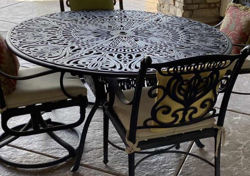 Photo 7 of HEAVY WROUGHT IRON PATIO TABLE 50” X 30”  (4 CHAIRS WITH CUSHIONS SOLD SEPERATELY)