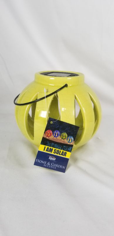 Photo 1 of  SOLAR LANTERN CERMATIC  PLASIC METAL COLOR GREENISH YELLOW NEW