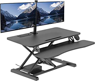 Photo 1 of Rocelco 37.4" Electric Standing Desk Converter Dual Monitor Mount Arm - AC USB Charger - Motorized Height Adjustable Sit Stand Up Computer Workstation Riser - Large Keyboard Tray - Black (R EDRB-DM2)
