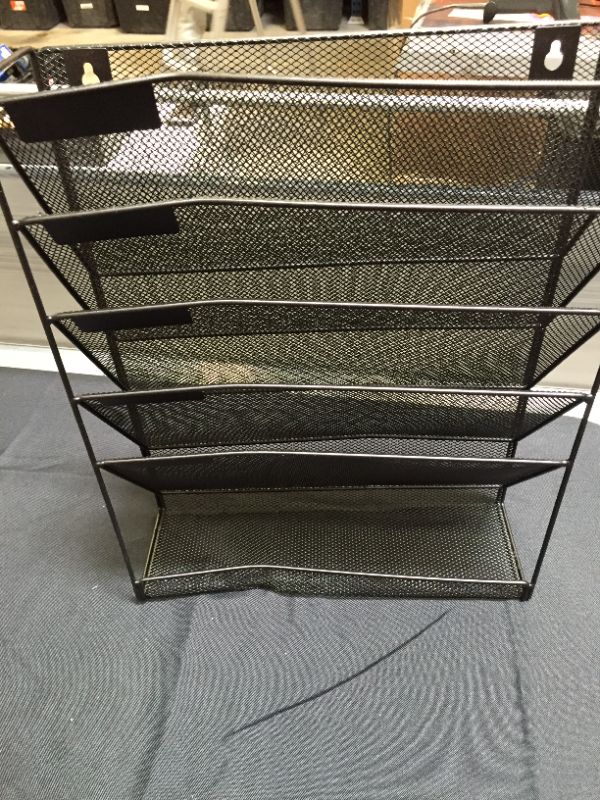 Photo 2 of EASEPRES 5 Pockets Mesh Wall File Holder Organizer Office Hanging Magazine Rack, Black---DENT AND WARPED AT THE BOTTOM AND AT THE TOP---
