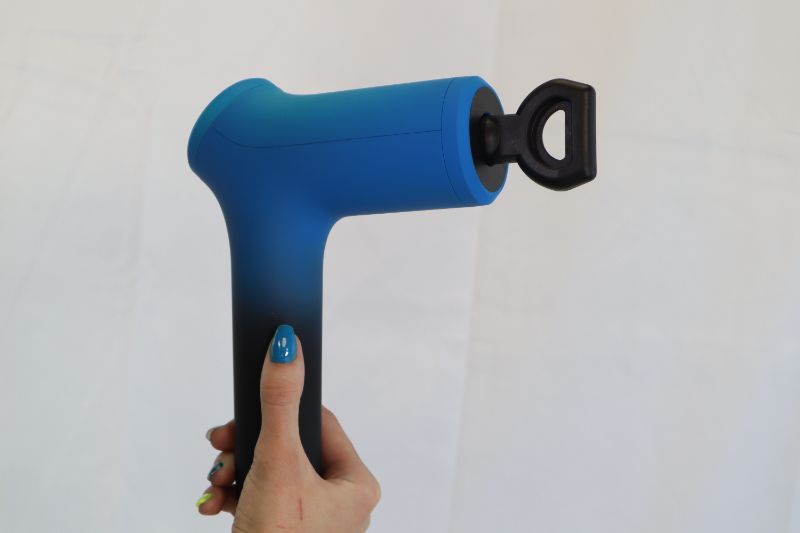 Photo 2 of BCORE MASSAGE GUN CHARGES 6 HOURS FOR FULL POWER 10 SPEED LEVELS 6 ADJUSTABLE HEADS FOR UPPER BODY OR LOWER BODY COLOR BLUE AND WHITE NEW 