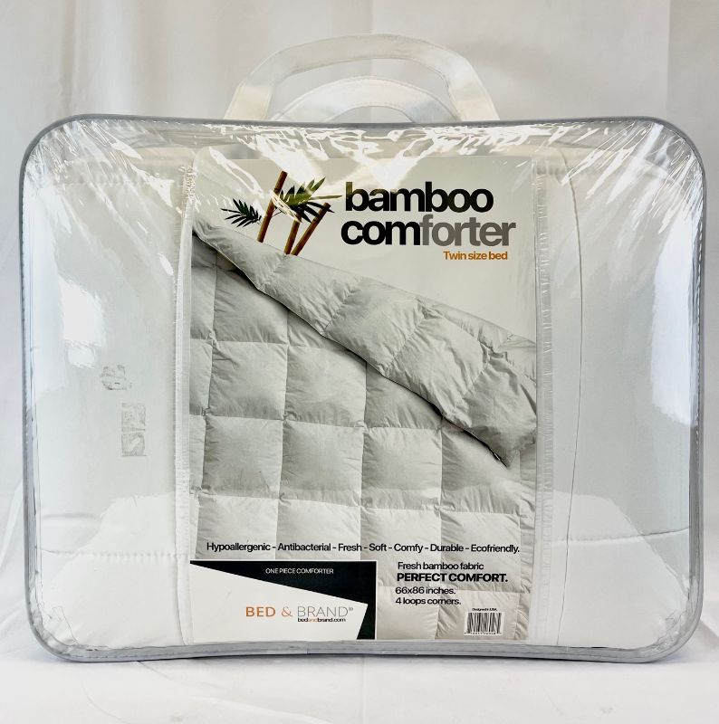 Photo 2 of  BAMBOO TWIN COMFORTER SILKY SMOOTH FEEL CAN BE USED AS IS OR AS DUVET COVER INCLUDES 4 SET OF TIES TO KEEP IN PLACE USED INSIDE A DUVET GSM FABRIC TEAR RESISTANT ANTIFUNGAL AND ANTI BACTERIA 5.2 POUNDS NEW