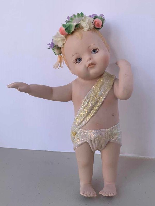 Photo 3 of TWO HANDPAINTED PORCELAIN BABIES, (STANDING BABY IS NUMBERED) , H 7”