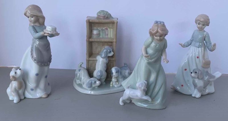 Photo 1 of 4 - PORCELAIN PUPPY AND GIRL FIGURINES, H 6.5”