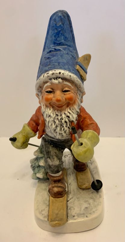 Photo 2 of PAIR OF GOEBEL PORCELAIN COLLECTIBLE KNOME ON SKIS FIGURINE H 8” AND "BE PATIENT" H6.6"
