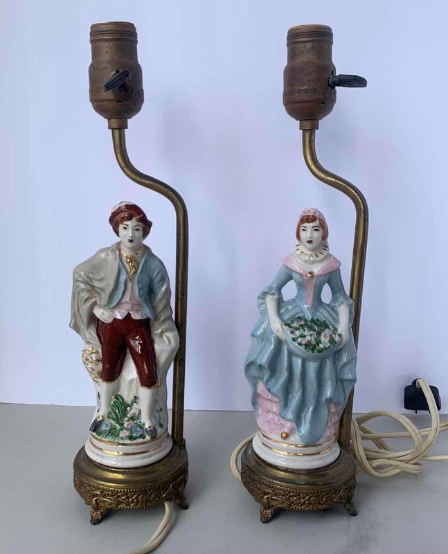 Photo 1 of TWO ANTIQUE HAND PAINTED PORCELAIN FIGURINES ON GOLD BASE