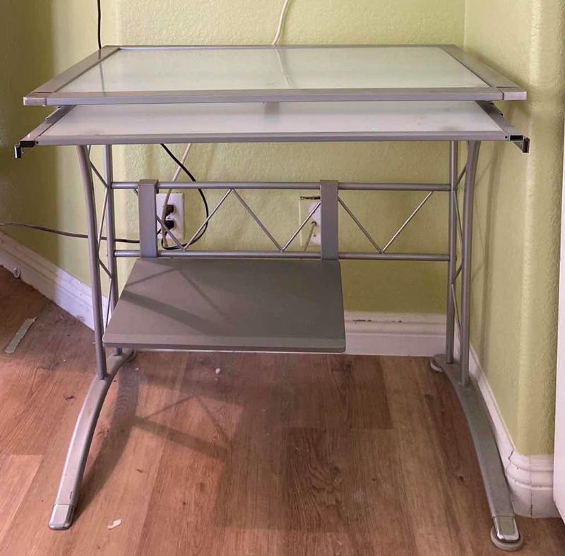 Photo 1 of METAL AND GLASS COMPUTER DESK WITH PULL OUT KEYBOARD SHELF 31” X  22” H29.5”