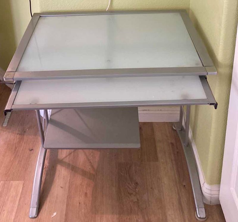 Photo 2 of METAL AND GLASS COMPUTER DESK WITH PULL OUT KEYBOARD SHELF 31” X  22” H29.5”