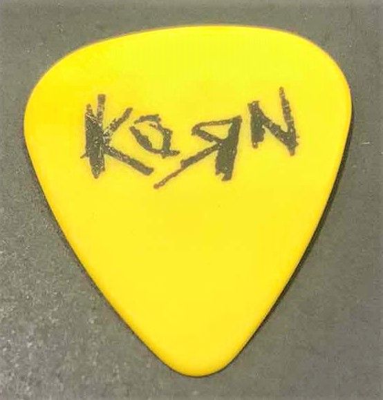 Photo 2 of COLLECTIBLE MEMORABILIA SIGNED GUITAR PICK, KORN LIFE IS PEACHY